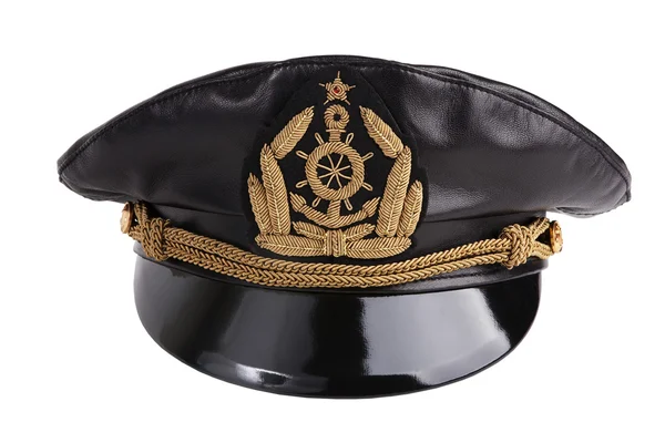 Navy black leather cap with an emblem — Stock Photo, Image
