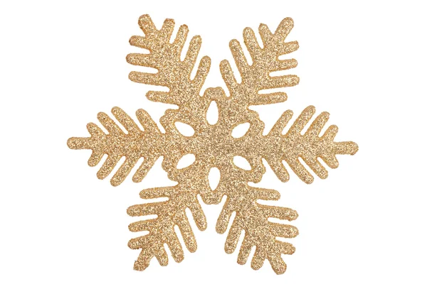 Decorative ornate gold-colored snowflake on white background — Stock Photo, Image