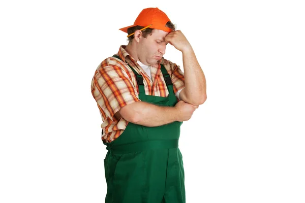 Pracownik, ubrany w zielony ogólnej — Zdjęcie stockowe