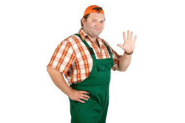 Cheerful worker in overalls and a baseball cap clipart