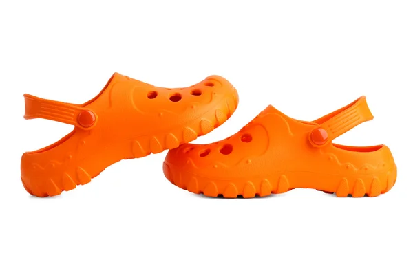 Un par de zapatillas de playa naranja cada uno — Foto de Stock