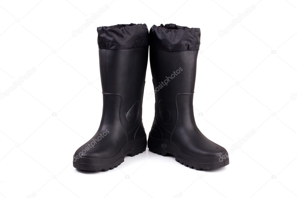 A pair of black rubber boots