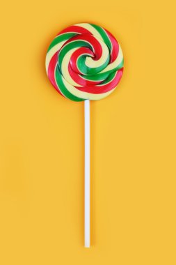 Sweet colorful candy with a stick clipart