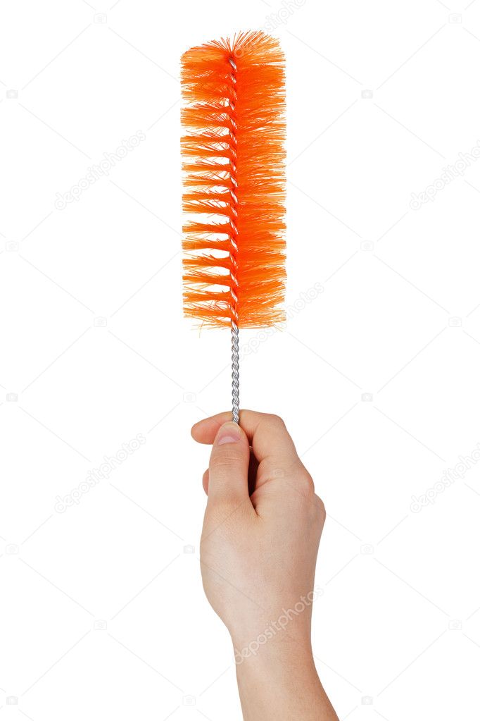 Orange brush for washing dishes and bottles