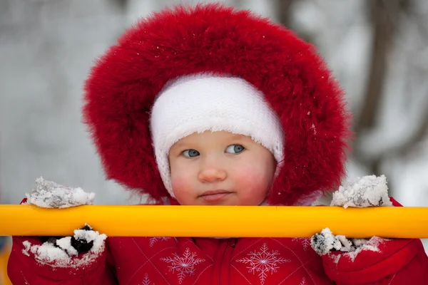 Little girl in a red jumpsuit — Stock Photo, Image