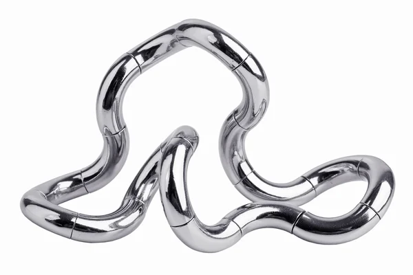 Puzzle in metallo sotto forma di curva — Foto Stock