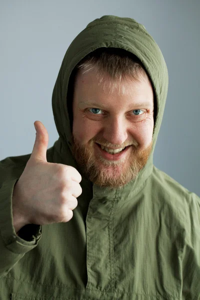 緑色のジャケットの男 — ストック写真