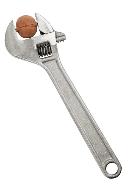 Spanner wrench with a nut — Stock Photo, Image