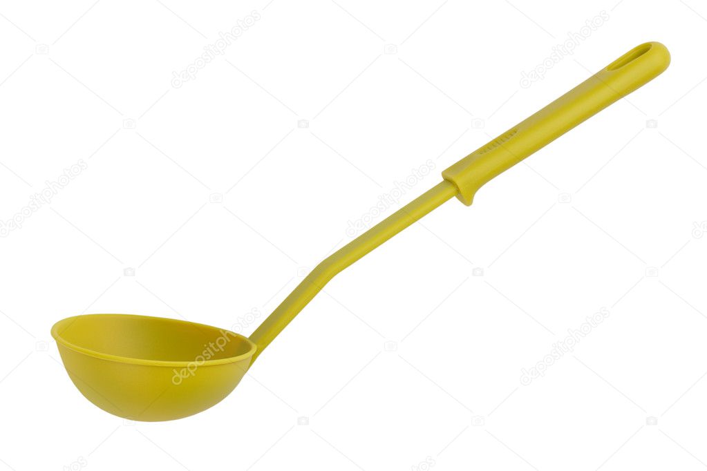 The green plastic kitchen spoon