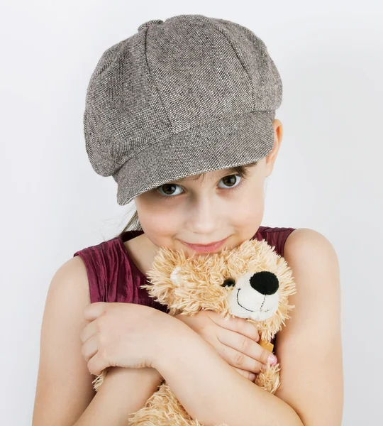 Girl in a gray cap — Stock Photo, Image