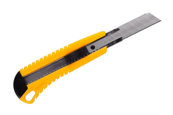 The yellow stationery knife — Stock Photo, Image