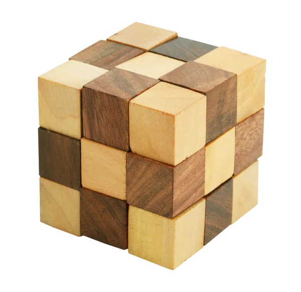 Rompecabezas en forma de bloques de madera sobre un fondo blanco —  Fotos de Stock