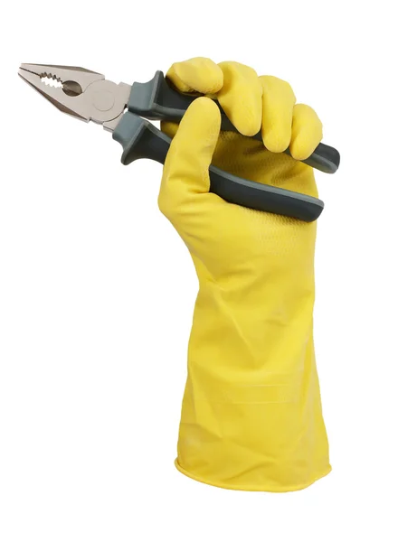 Χέρι-κίτρινο γάντι που κατέχουν ένα ζευγάρι των πενσών — Φωτογραφία Αρχείου