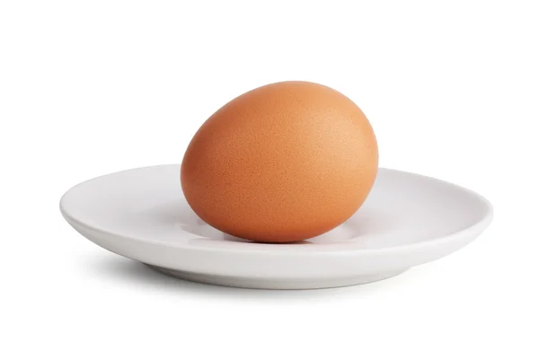 Boiled egg in a porcelain dish — Stock Photo, Image