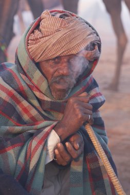 Man Smoking A Hookah clipart