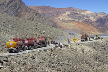 Road works on a Mountain Road clipart