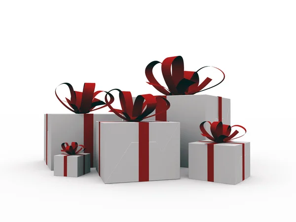 Geschenke mit roten Bändern auf weißem Hintergrund — Stockfoto