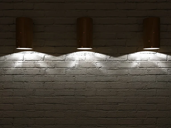 Прожекторы на стене из белого кирпича — стоковое фото