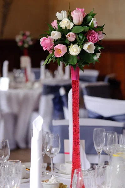 Wedding flowers on red stand — Stock Photo, Image