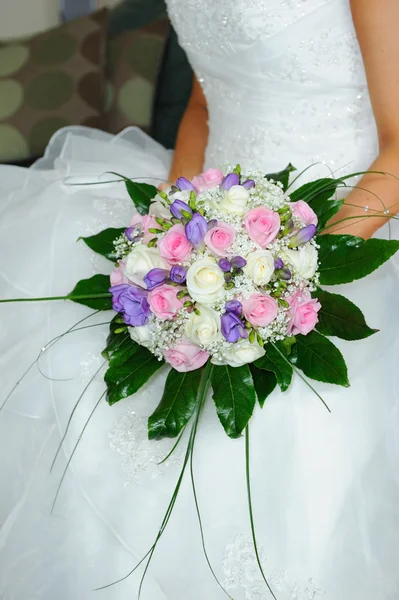 Brides flowers on dress — Stock Photo, Image