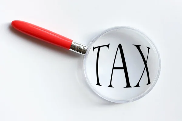 stock image Tax Magnifying Glass