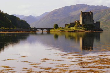 Ancient highland castle with bridge clipart