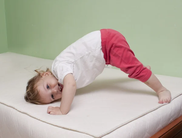 Baby yoga exercise — Stock Photo, Image