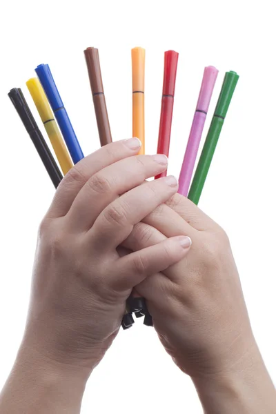 Hand with colorful pens — Stock Photo, Image