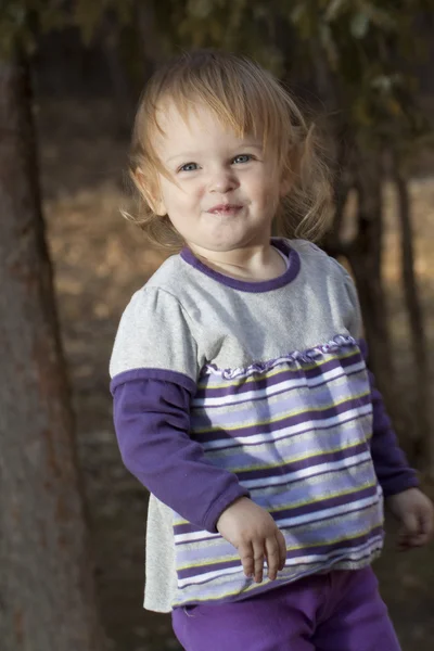 Baby girl in a park — Stock Photo, Image