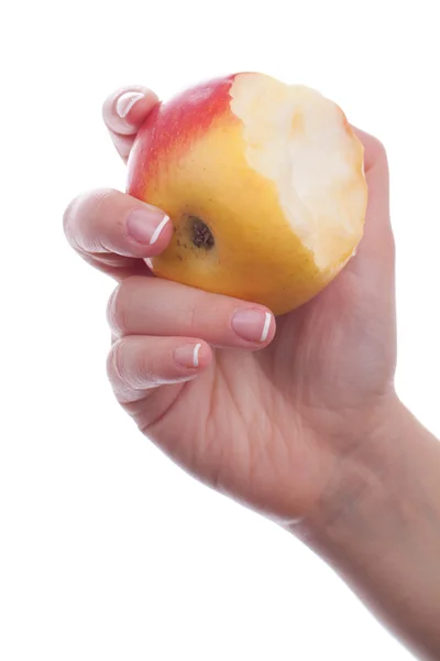 Hand with eaten apple — Stock Photo, Image