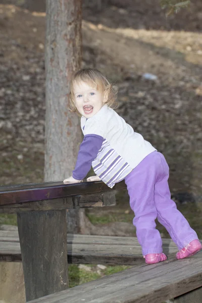 Baby girl in a park — Stock Photo, Image