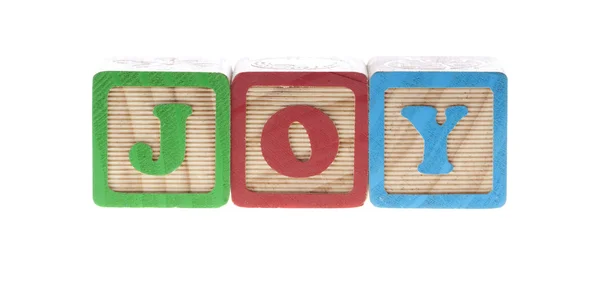 Joy wooden cubes — Stock Photo, Image