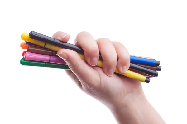 Hand met kleurrijke pennen — Stockfoto
