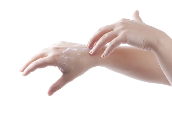 Stock image Hand cream applying