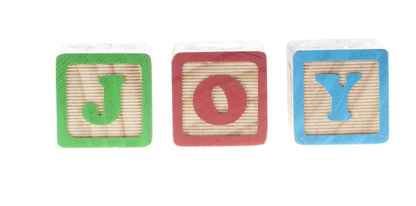 Joy wooden cubes — Stock Photo, Image