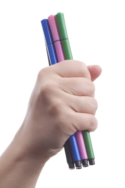 Main avec stylos colorés — Photo
