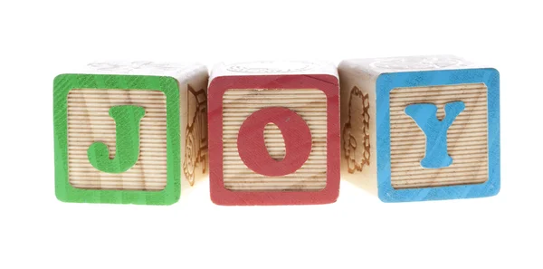 Джой деревянные кубики — стоковое фото