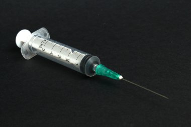 Syringe with needle clipart