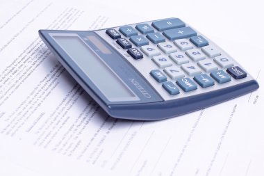 Calculator on a document clipart