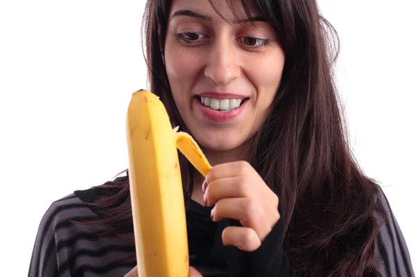 Pretty girl peeling a banana — Stock Photo, Image