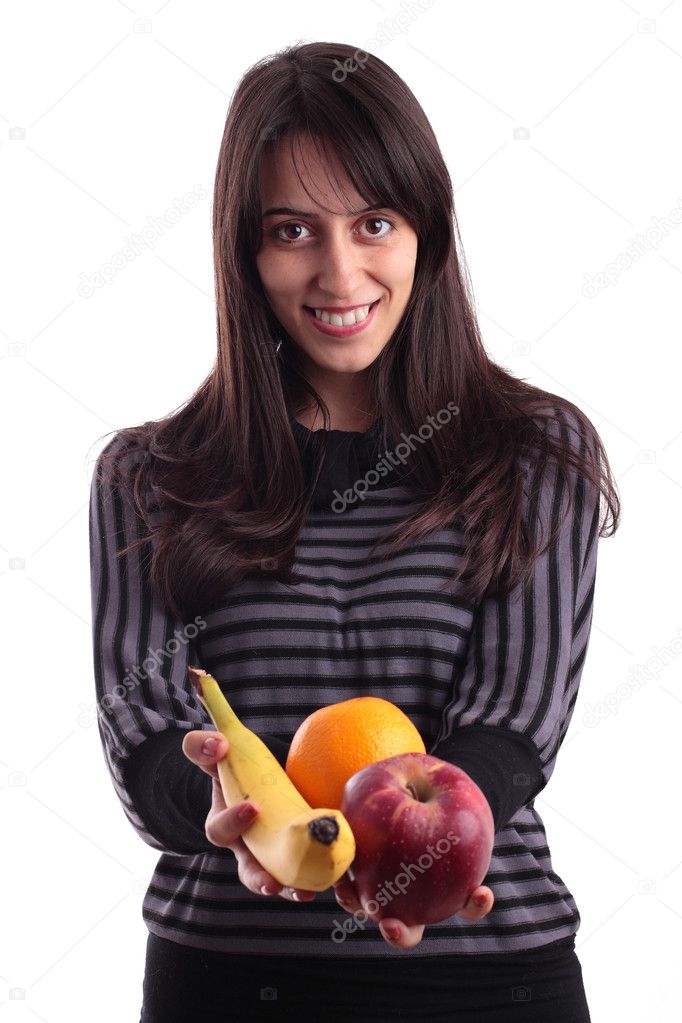 Young woman holding fruits