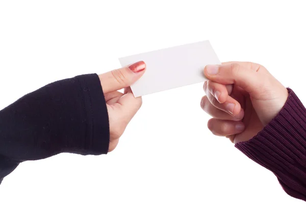 Dos manos de damas sosteniendo una tarjeta de visita — Foto de Stock
