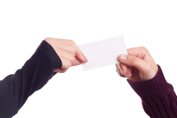 Duas senhoras mãos segurando um cartão de visita — Fotografia de Stock