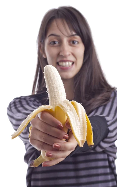 Девушка держит банан — стоковое фото