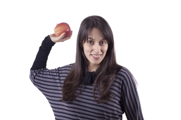 La ragazza sta lanciando una mela — Foto Stock