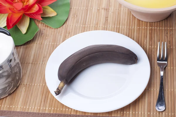 stock image Brown banana in a dish