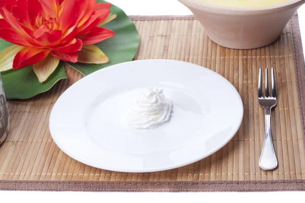 stock image Shaped cream rose in a dish