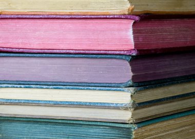 Stack of Old, Colorful Books clipart