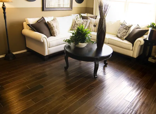 Hardwood flooring in modern living room — Stock Photo, Image