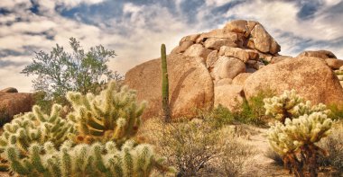 Desert landscape with red rock buttes clipart